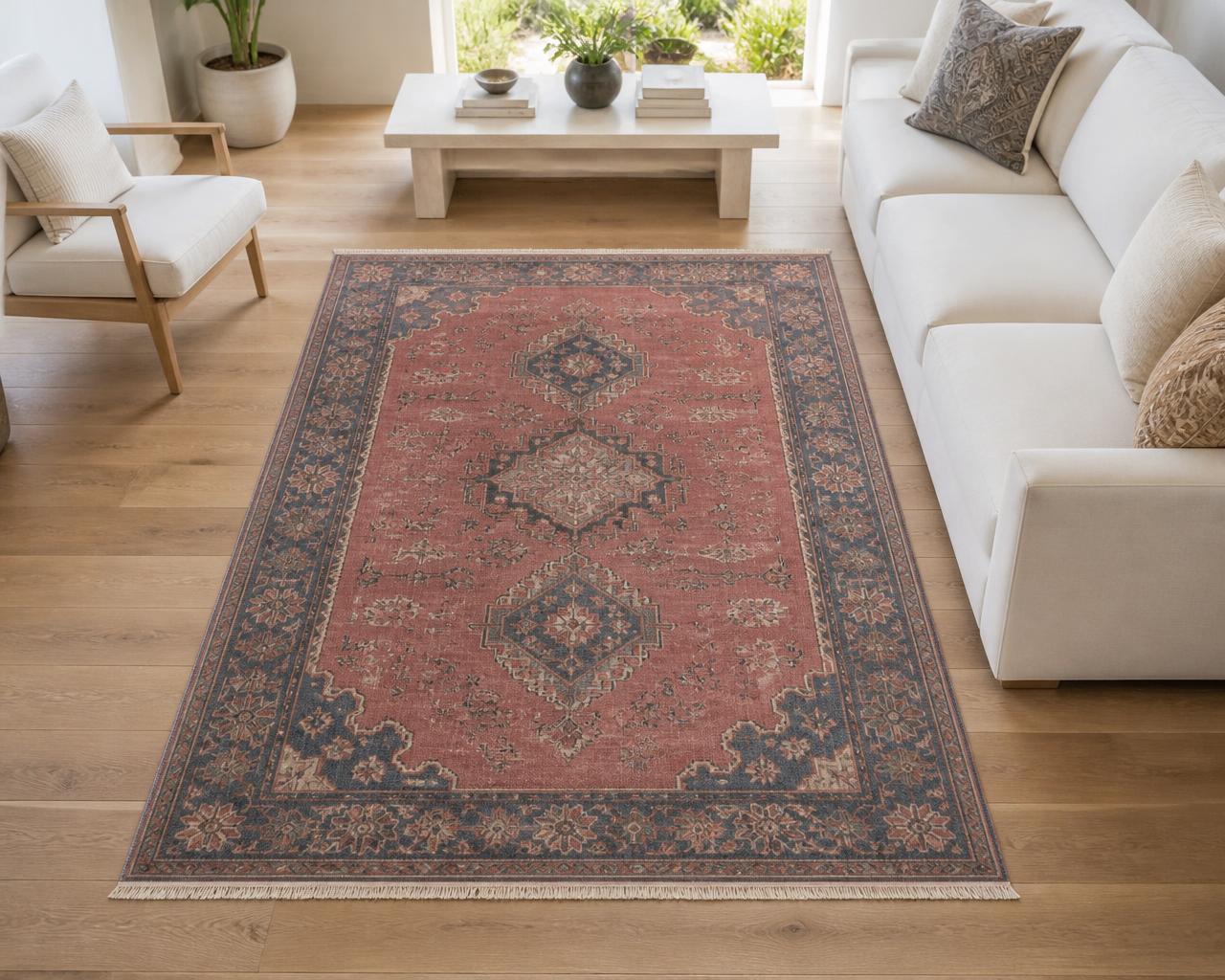 Master weaver restoring an antique rug